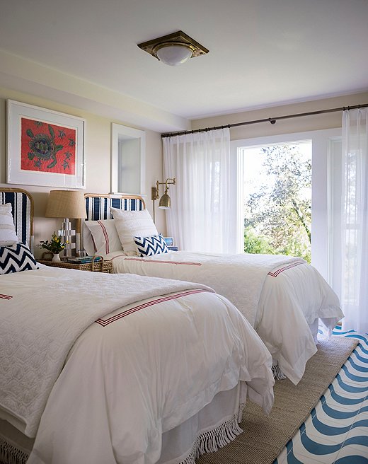 As seen above and at right, choosing flush mounts over pendants or chandeliers keep the rooms from feeling cluttered. Above: Design by Lisa Hilderbrand; photo by John Bessler.
